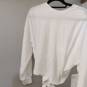White athletica stretchy sweater open back.
